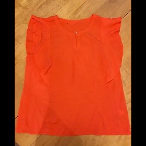 Orange ruffle blouse